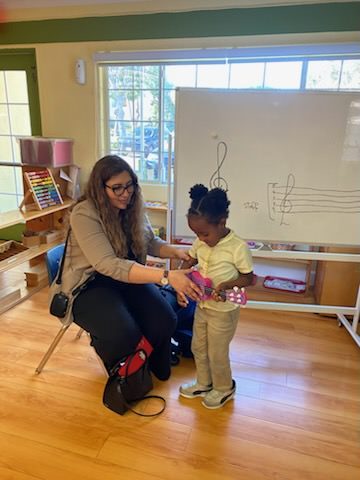 Teacher with a student at Slater Montessori
